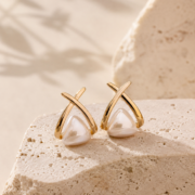 Geometric Cross‑Frame Pearl Stud Earrings - Image 3